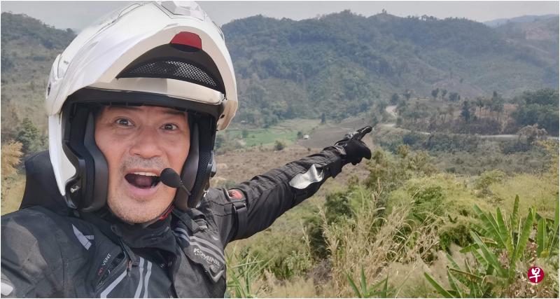 林明伦骑电单车飞奔2700公里 趁马"锁国"前连夜赶回新